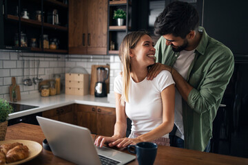 Loving couple looking each other an smiling