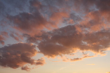 Naklejka na ściany i meble Colorful cloudy sky at sunset