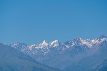 Fototapeta na wymiar view of the snow-capped mountains