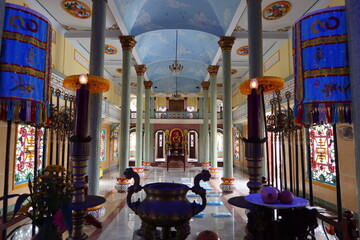 Hoi An, Vietnam, November 19, 2020: Main hall of worship seen from the main altar of the Cao Dai temple in Hoi An