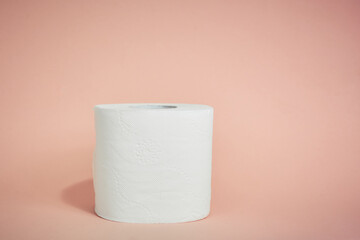 toilet paper on a pink background, essential goods, personal hygiene item