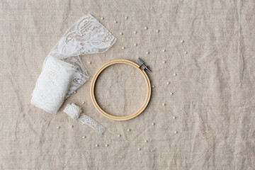 Handy craft concept, sew details on canvas textile background 