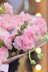 Big beautiful blossoming mono bouquet of pink ranunculus clooney hanoi flowers. Flower composition. Macro photo.