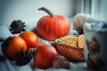 Orange pumpkin with persimmon, walnuts, cookies and marshmallow coffee