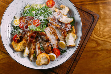 Fresh Healthy Classic Caesar Salad with Chicken on a Plate