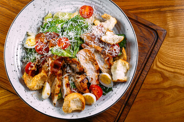 Fresh Healthy Classic Caesar Salad with Chicken on a Plate