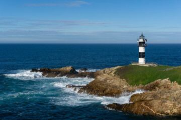 view of the lighthouse on Isla Pancha in Galicia