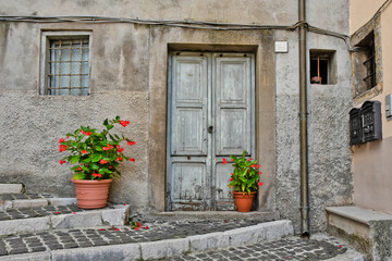 Fototapeta na wymiar The door of an old house in Patrica, an ancient town in the Lazio region, Italy.