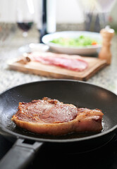 Beef steak to be fried in a hot pan