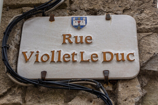 Carcassonne / France - March 15, 2020: Carcassonne Cit&eacute; street sign Rue Viollet Le Duc Street.