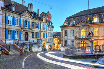 Night scene with car trails along the Rue du Chateau in Neuchatel, Switzerland