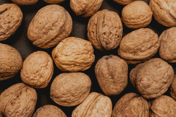 walnuts on a black background, macro