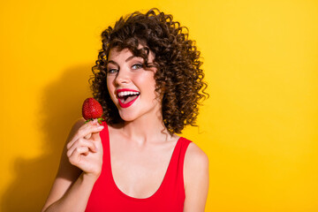 Photo of charming pretty lovely tempted curly red lipstick lady eat enjoy summer season fruits hold...