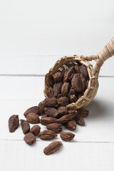 Cardamom on a bamboo spoon