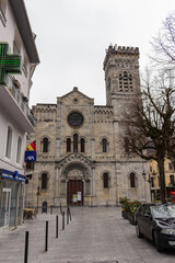 Fototapeta premium Bagnères-de-Luchon / France - March 13, 2020: The Church of Our Lady of the Assumption of Bagnères-de-Luchon (Notre-Dame-de-l'Assomption). Romanesque style, with some architectural Byzantine-inspired.