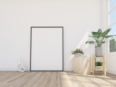 Empty picturer frame on the floor in cozy space. Interior frame mockup.3d rendering