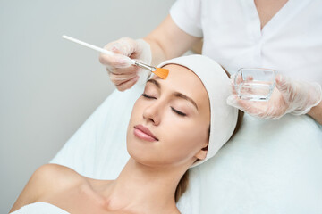 Cosmetology beauty procedure. Young woman skin care. Beautiful female person. Rejuvenation...