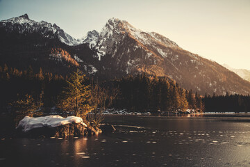 A mountain panorama with a view of the Alps and the Zugspitze with a mountain lake. A picturesque...