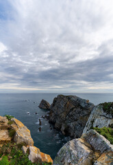 Fototapeta na wymiar view of the wild and savage coast at the Cabo de Penas in Asturias