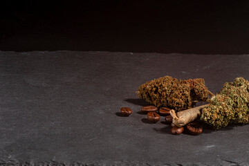 Medical cannabis marijuana joint with coffee beans.
