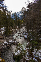 The Valley of Marcadau with the river Marcadau in winter. The heart of the ski station of Pont d’Espagne, Pyrenees National Park, Hautes-Pyrénées department, Occitanie, France.
