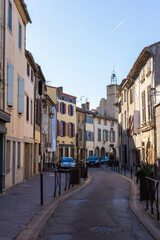 Fototapeta na wymiar Carcassonne / France - March 11, 2020 - The Cité de Carcassonne is a medieval citadel in the department of Aude, Occitanie region. Picturesque typical narrow street Rue de la Trivalle.