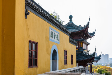 Fototapeta na wymiar Guanyin Hall & Pavilion in historic Buddhist Jinshan Temple, first established in 4th-CE, Zhenjiang, Jiangsu. Heritage & tourist attraction.