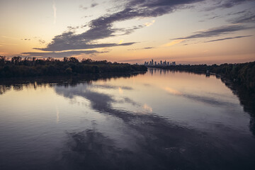 Vistula River and city downtown in Warsaw, capital of Poland - aerial view from Siekierkowski Bridge