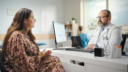 Obraz premium Doctor Consultation Office: Female Patient Describes Her Complaints, Symptoms to Male Physician. Medical Health Care Specialist Explaining Test Results, Prescribing Medicine. Latin People