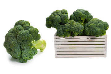 Fresh tasty broccoli in wooden box isolated