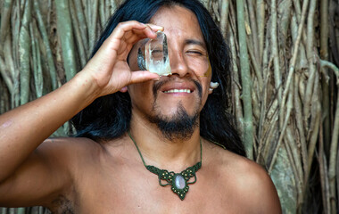 Portrait of native american Indian young man wearing mineral stone necklace