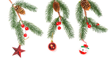 Christmas composition. Spruce branches with New Year's decorations on a white background. Flat lay, top view, copy space