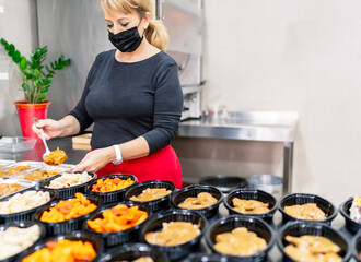 cook preparing dishes for the needy