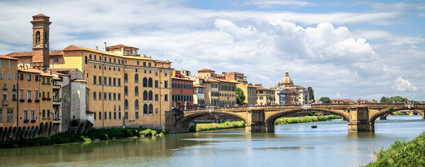 The embankment and bridge of the Ponte Santa Trinita in Florence, Italy. Panorama