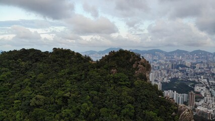 Fototapeta na wymiar Lion rock landscape with the hong kong kowloon cityscape with gloomy weather