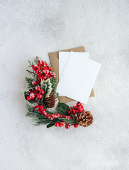 Blank card on white background with spruce branch. Flat lay composition with copy space. - 393565410
