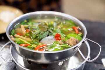 Chicken feet spicy soup in hot pot. Thai food style