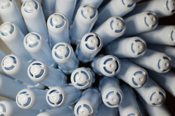 Markers with their cap arranged in a beautiful geometric composition