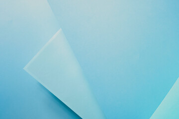 multi-level blue paper background, one paper on top of another