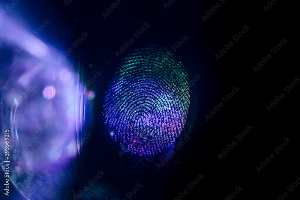 Poster close up beautiful abstract multi colored fingerprint on background texture for design. macro photog