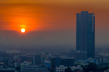 Fototapeta premium Panorama view of panoramic city views, overlooking a wide range of high-rise buildings, blurred breezes, residential distribution (condominiums, offices, expressways)