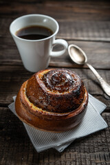 Morning still life of hot fresh home baked buns and coffee