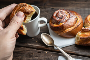 Morning still life of hot fresh home baked buns and coffee