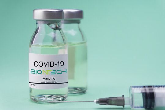 Coronavirus vaccine concept and background. New vaccine pfizer and biontech isolated on blue background. Covid-19, 2019-nCov pandemic.