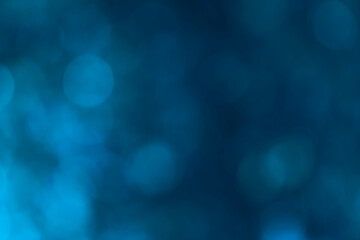Dark and deep blue bokeh lights texture background