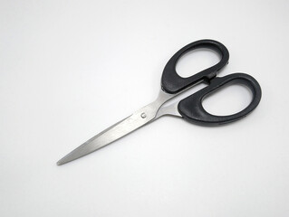 Stainless steel scissors with black handle