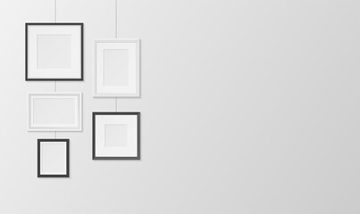 Pictures, photos frames white and black design hanging on wall horizontal banner. Passepartout.