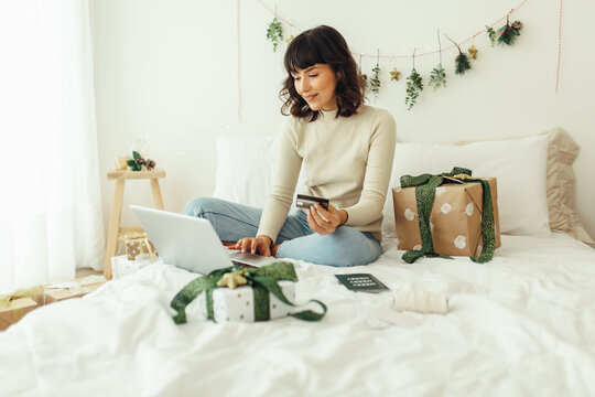 Woman doing online christmas shopping
