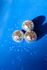 Disco balls on blue background
