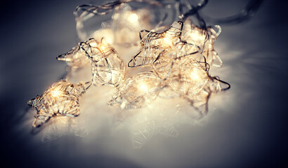 Christmas luminous garland in the shape of stars
